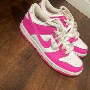 Pink Nike Dunk 
Size kids 4.5 equivalent to 6.5 women 
Used once